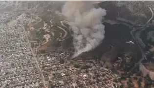 Evacuation Orders Lifted as Crews Contain Bethany Fire in Burbank, California
