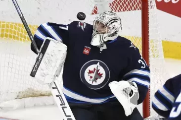 Connor Hellebuyck Nets Vezina and Hart Trophies in Rare Double Win
